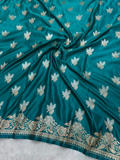 Premium Peacock Blue Katan Silk Banarasi Saree with Delicate Floral Arch Border and Traditional Bouquet Leaf Butis