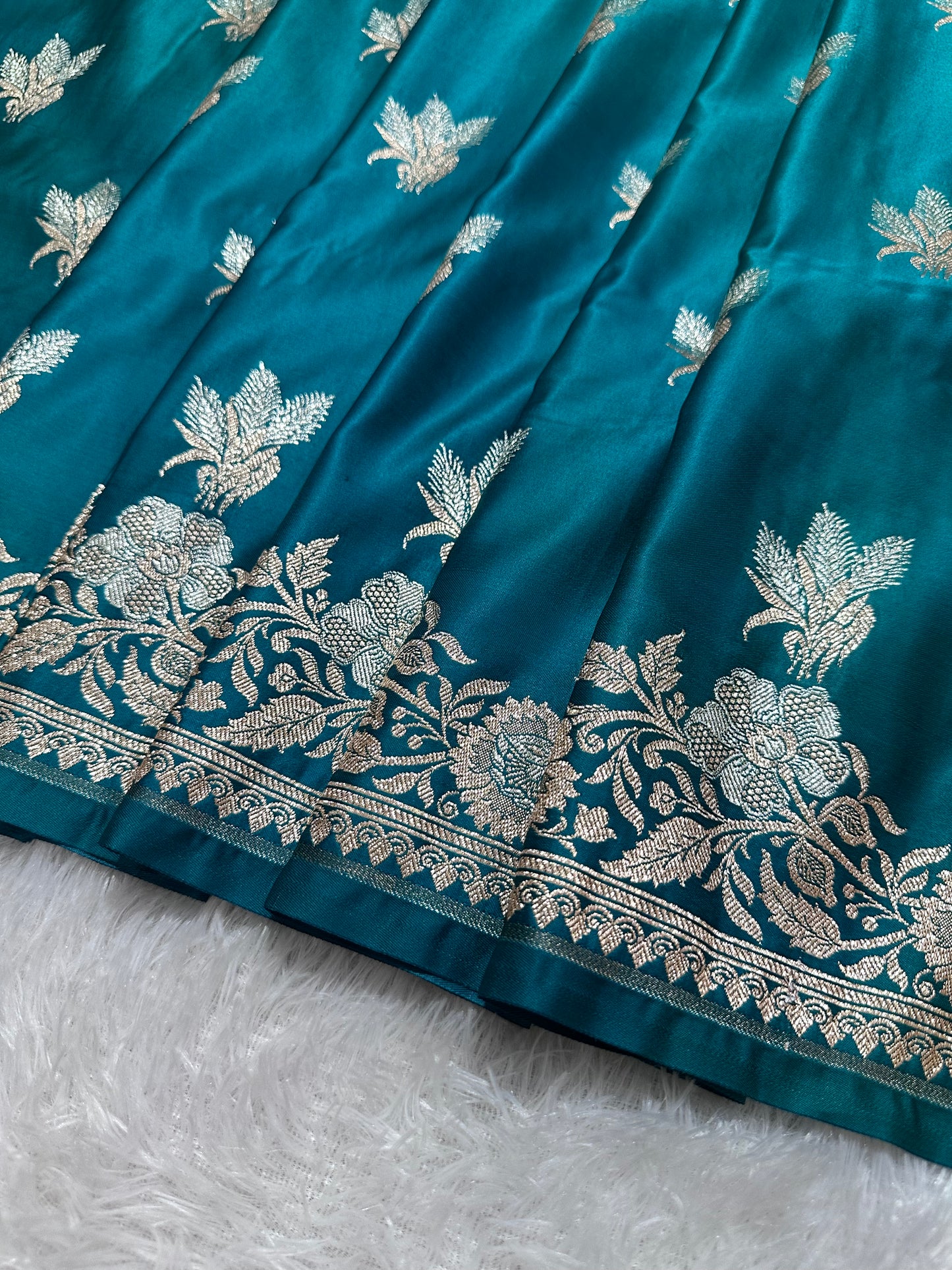 Premium Peacock Blue Katan Silk Banarasi Saree with Delicate Floral Arch Border and Traditional Bouquet Leaf Butis