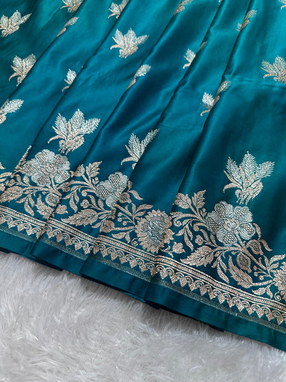 Premium Peacock Blue Katan Silk Banarasi Saree with Delicate Floral Arch Border and Traditional Bouquet Leaf Butis