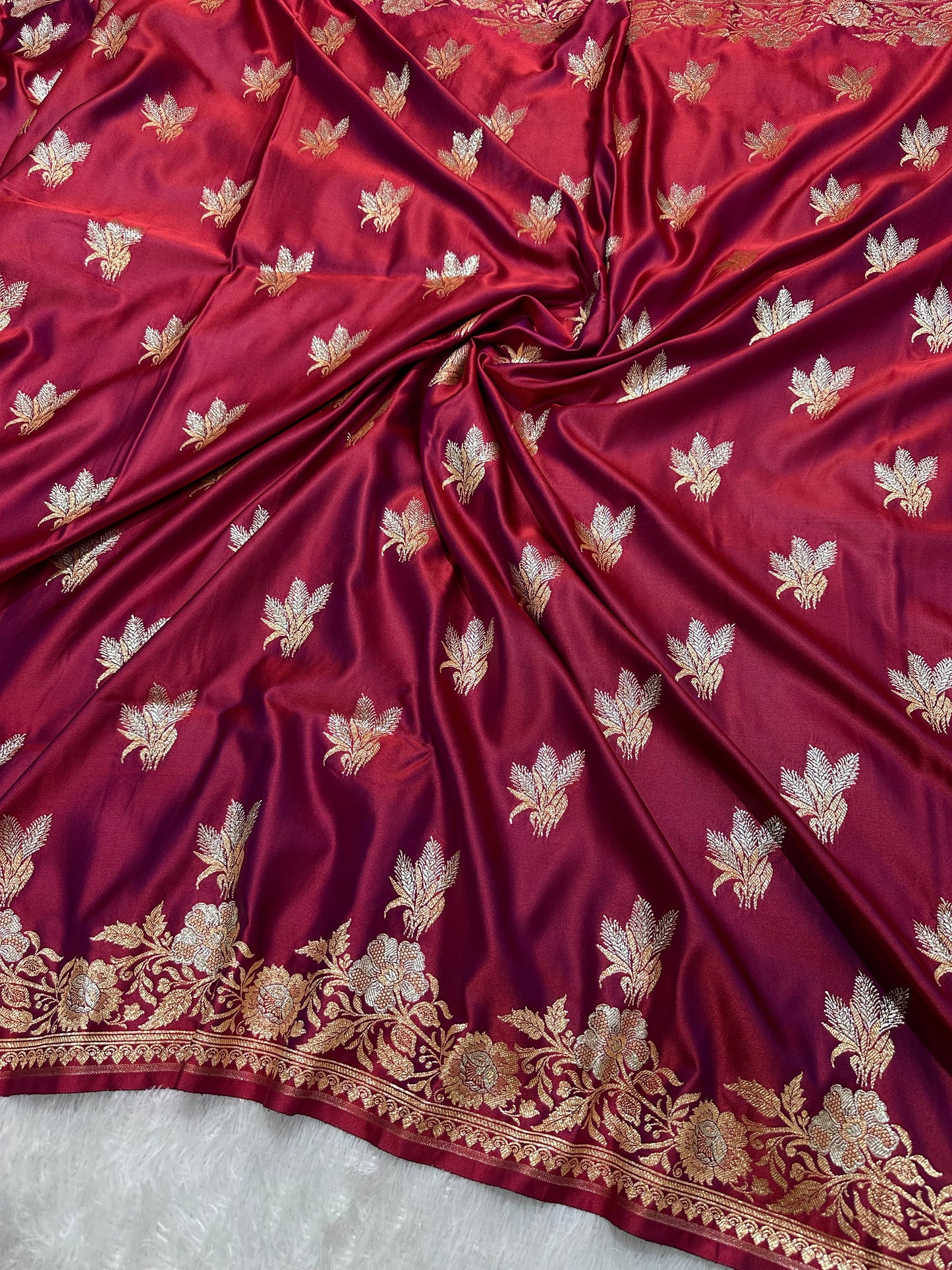 Elegant Wine Purple Katan Silk Banarasi Saree with Delicate Floral Arch Border and Traditional Bouquet Leaf Butis