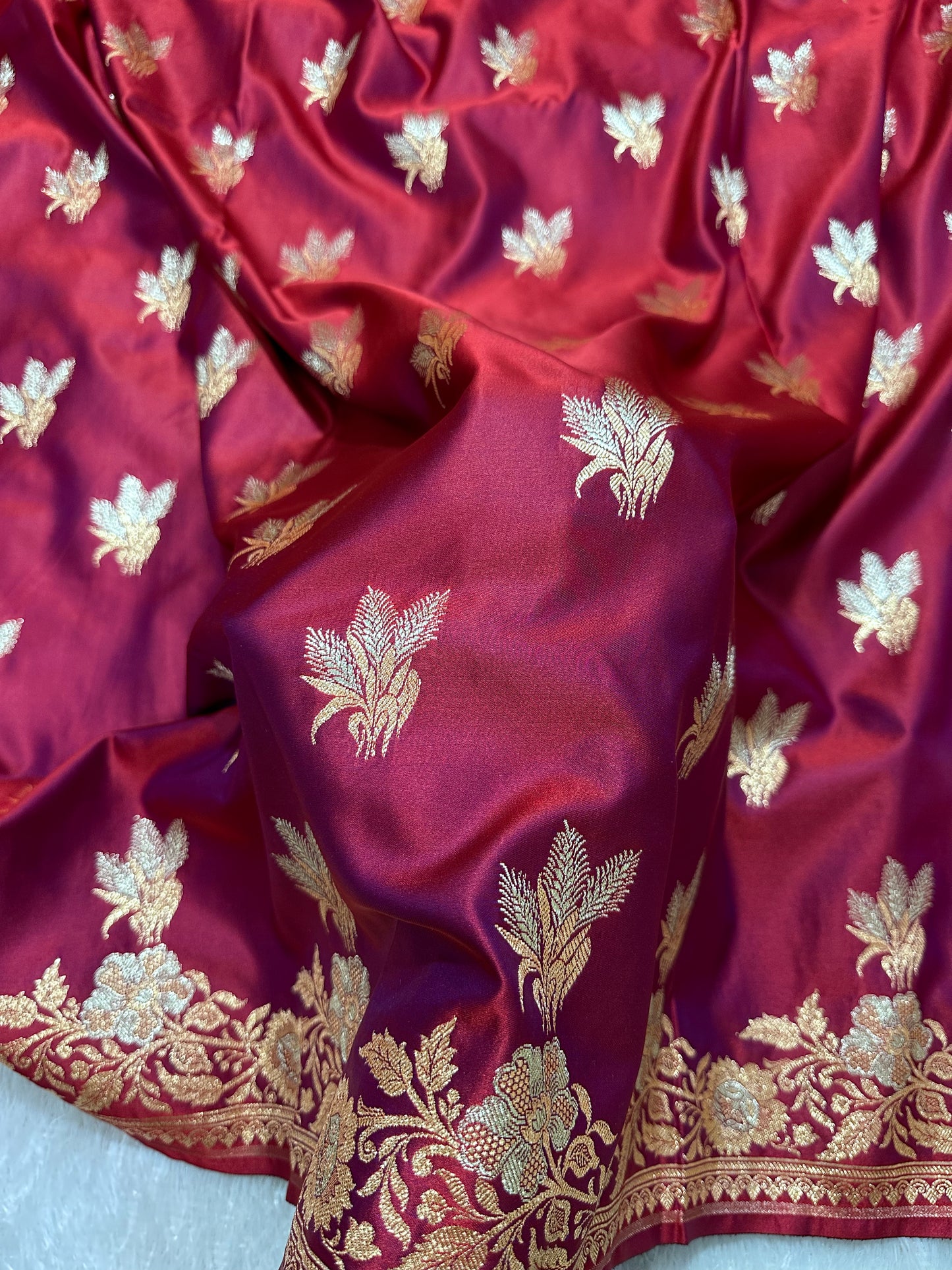 Elegant Wine Purple Katan Silk Banarasi Saree with Delicate Floral Arch Border and Traditional Bouquet Leaf Butis