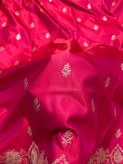 Ornate Rani Pink Katan Silk Banarasi Saree with Delicate Floral Arch Border and Full-Bloomed Rose Butis