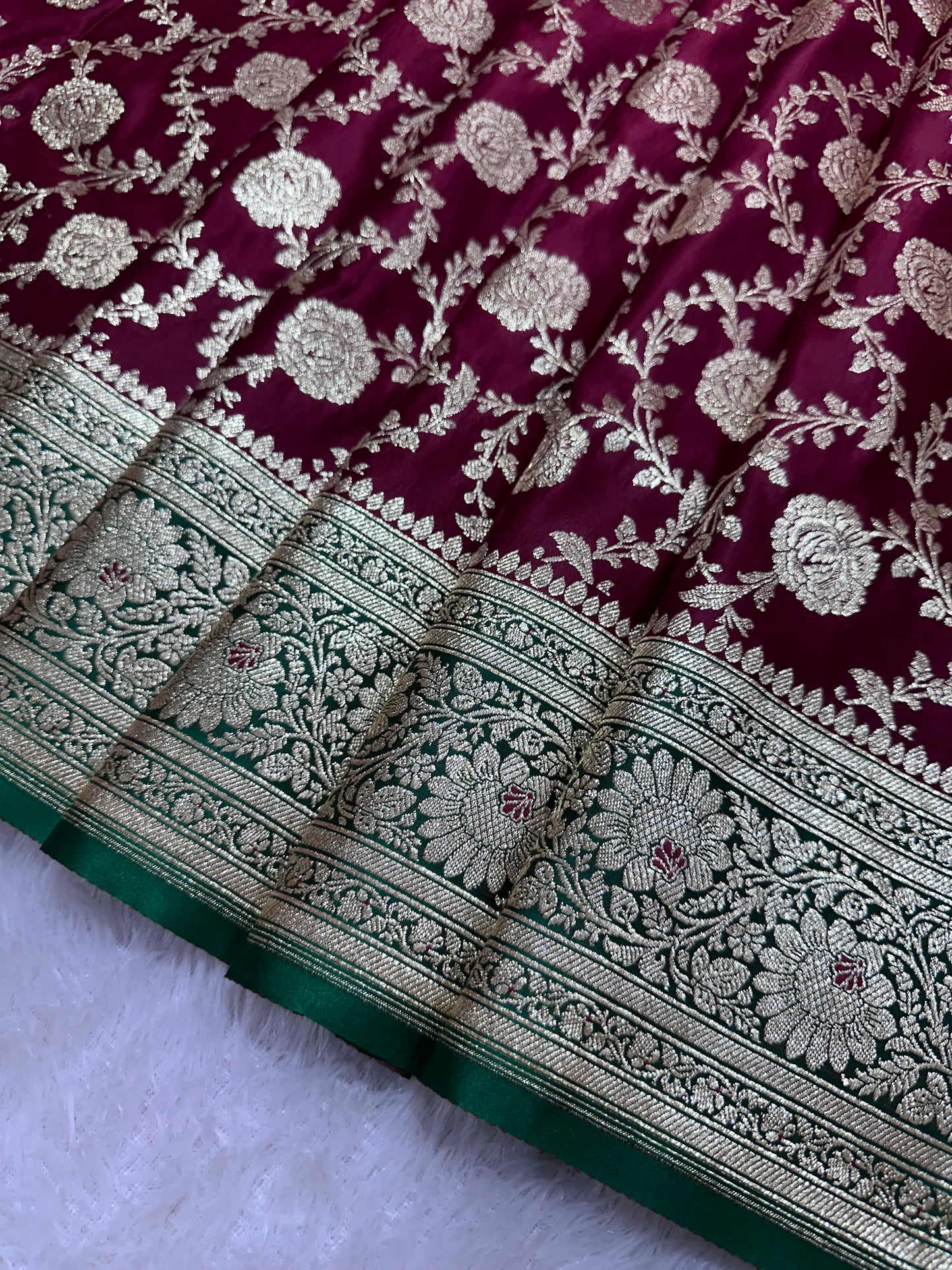 Royal Wine Plum Katan Silk Banarasi Saree with Contrasting Green Border and Full Rose-Vine Jaal Work