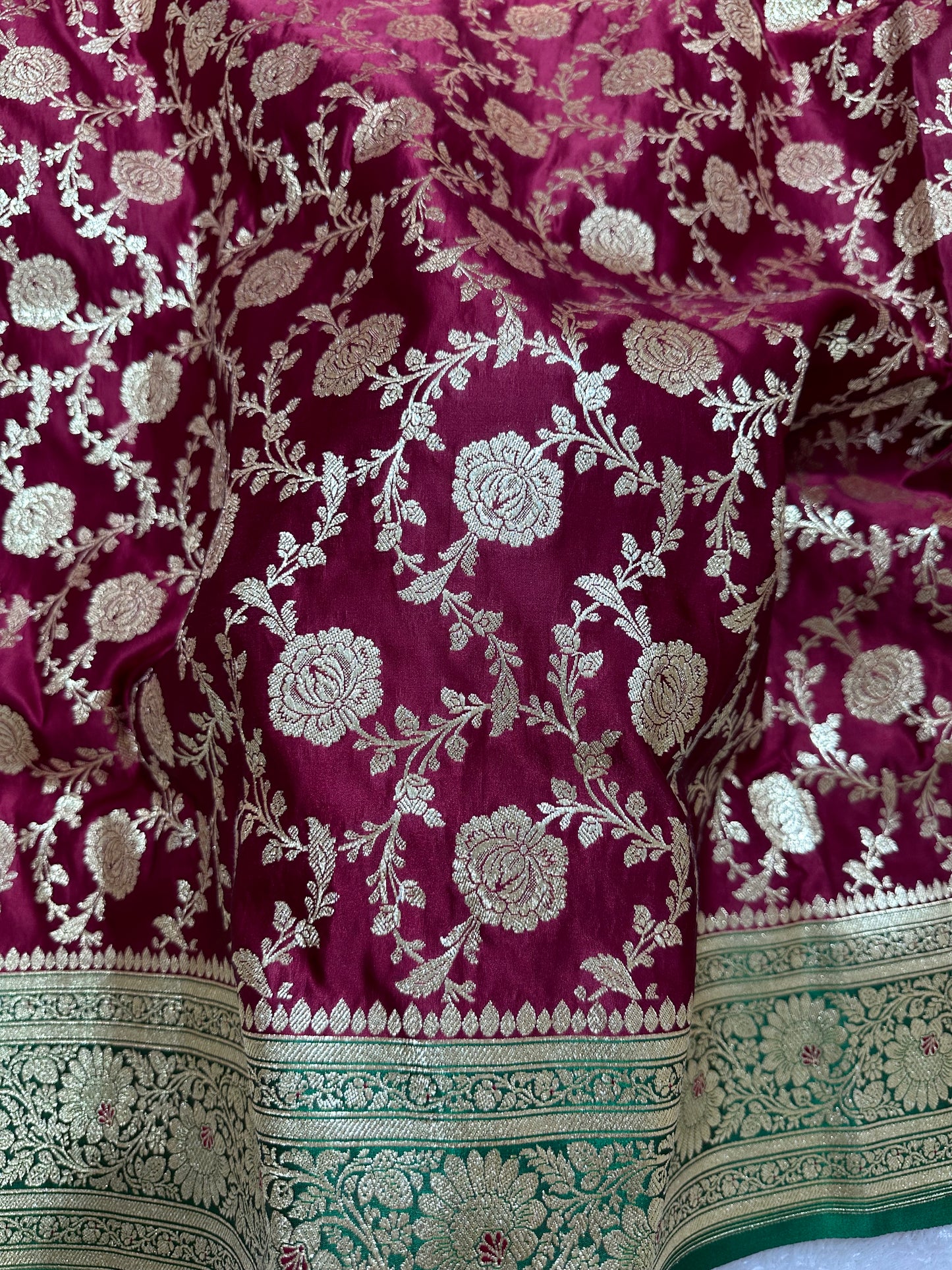 Royal Wine Plum Katan Silk Banarasi Saree with Contrasting Green Border and Full Rose-Vine Jaal Work