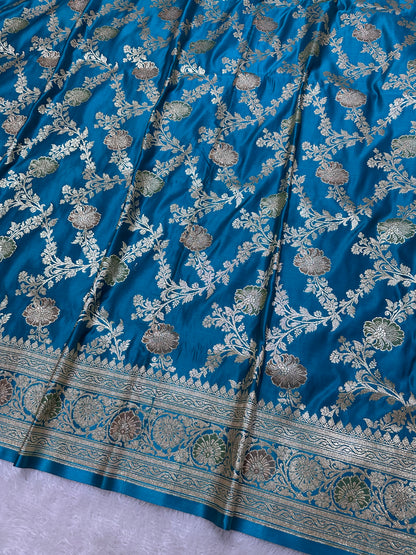 Premium Peacock Blue Katan Silk Banarasi Saree with Traditional Floral Vine Jaal and Ornate Zari Border