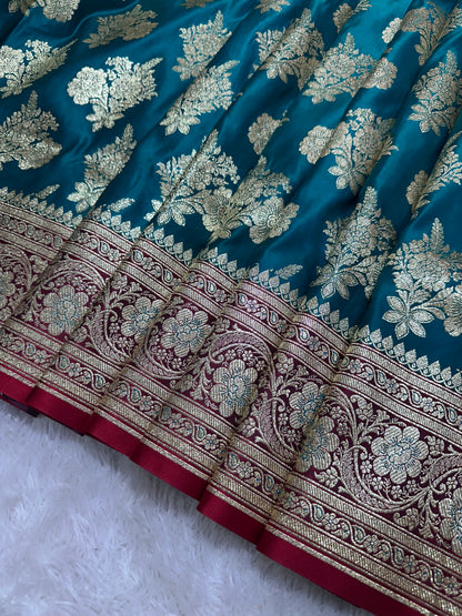 Premium Peacock Teal Green Katan Silk Banarasi Saree with Royal Heritage Pallu and Traditional Bouquet Leaf Butis